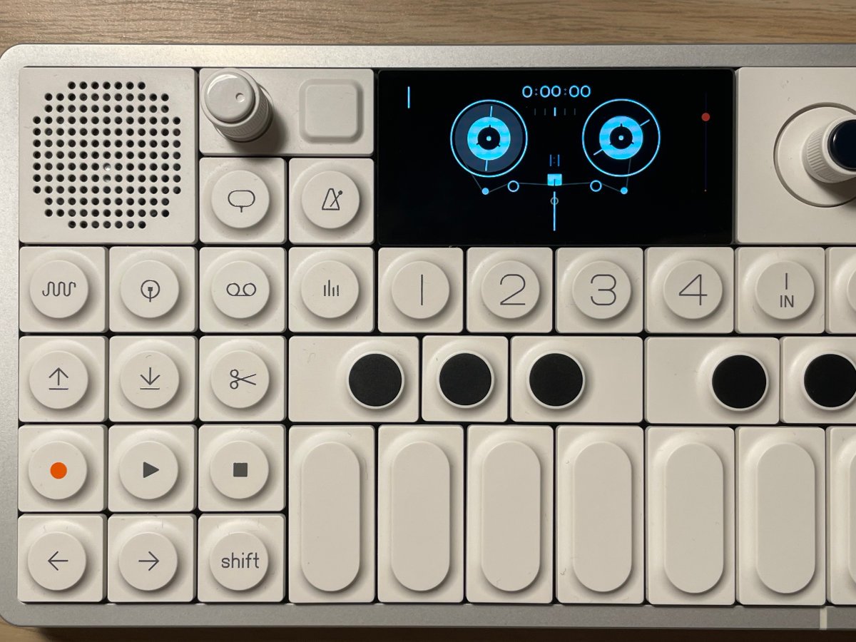 A close-up shot of the left side of the OP-1 field's front plate.
